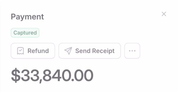 Payment confirmation window showing amount $33,840.00 with status Captured and options to Refund or Send Receipt.