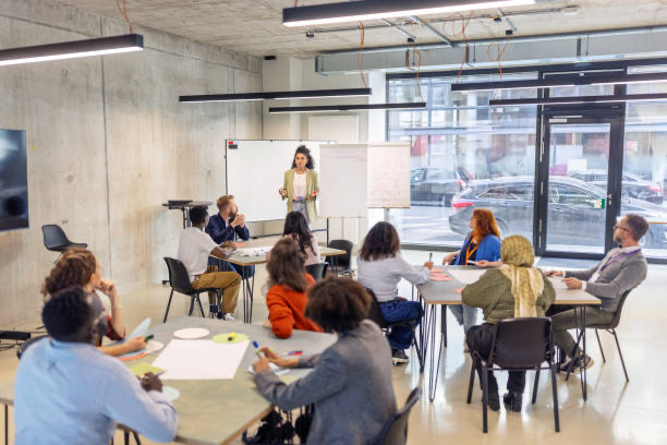 Facilitator leading a small-group Martyn's Law training session