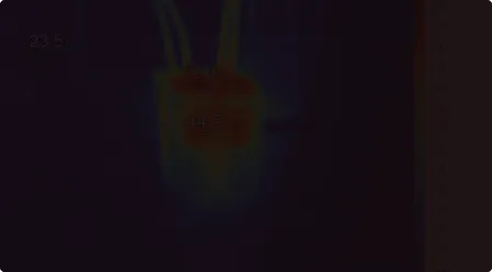 Thermal image showing temperature readings of 23.5, 44.5, and 52.0 degrees Celsius on an electrical device.