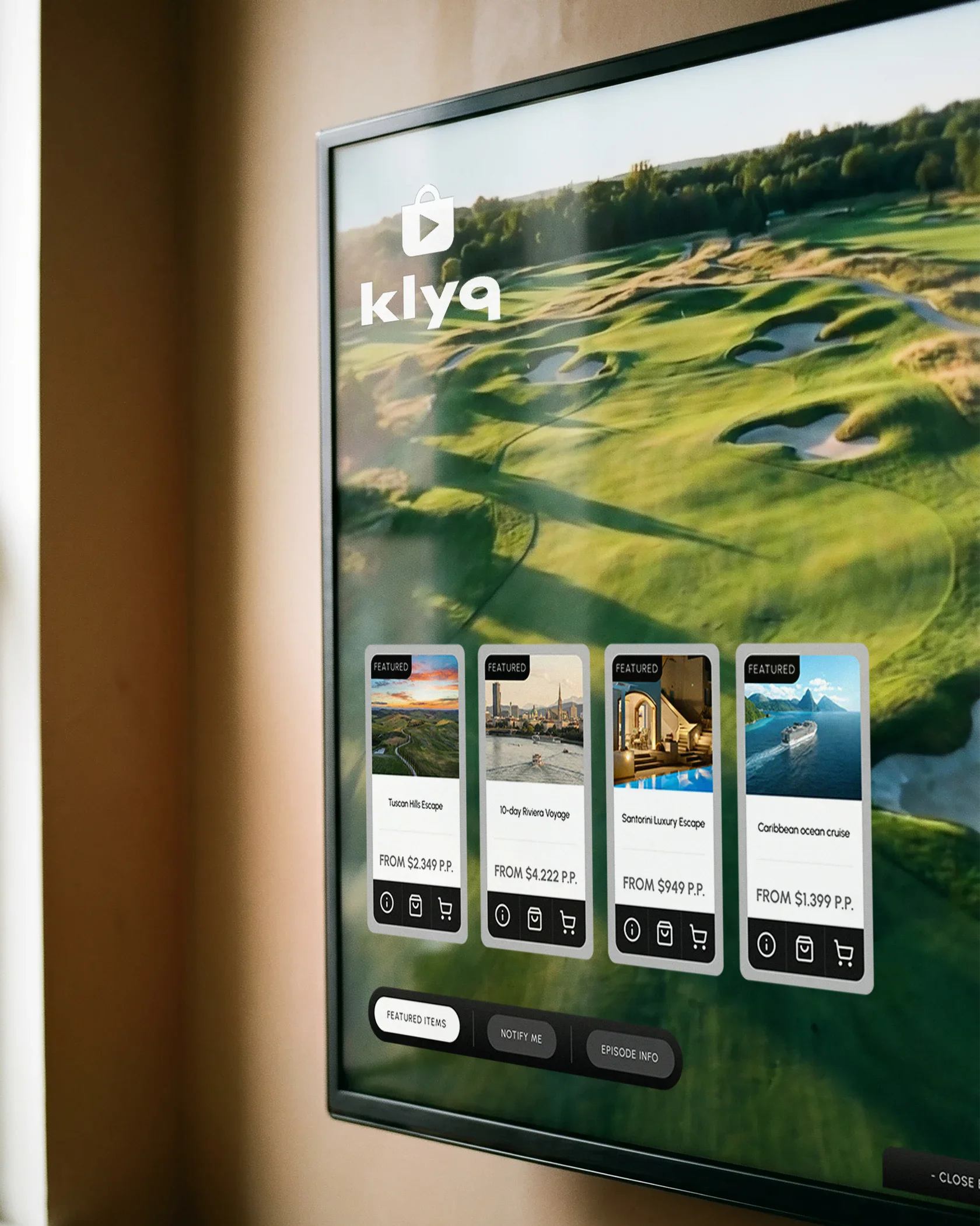 A smart TV with the Klyq buy bar interface in the corner.