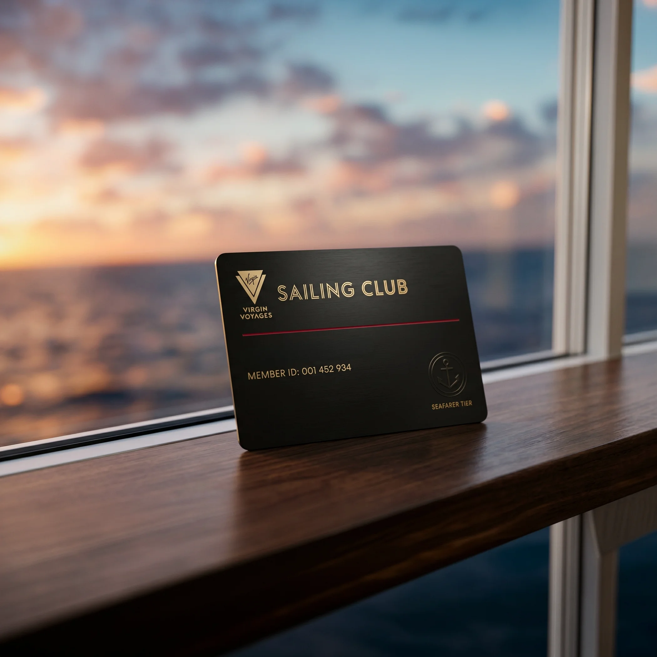 Virgin Voyages Sailing Club membership card on a wooden surface with ocean and sunset in the background.