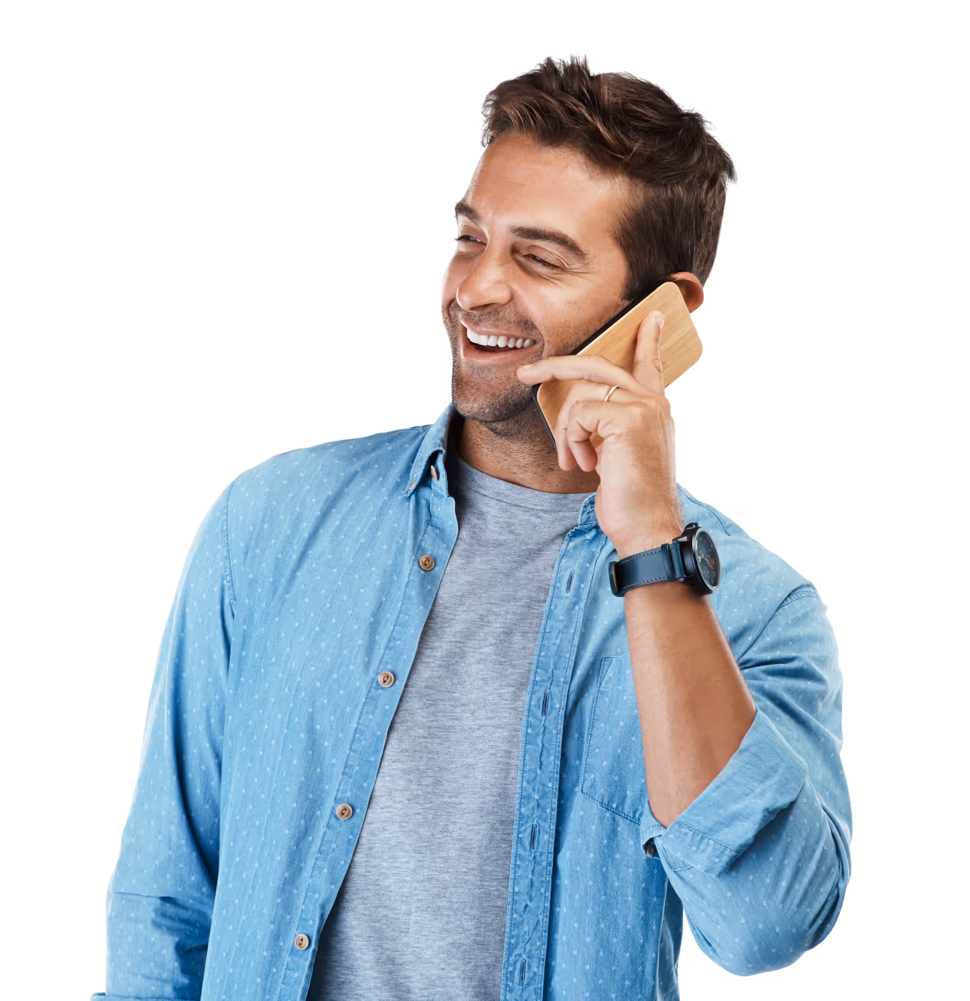 A man holding a phone up to his ear.