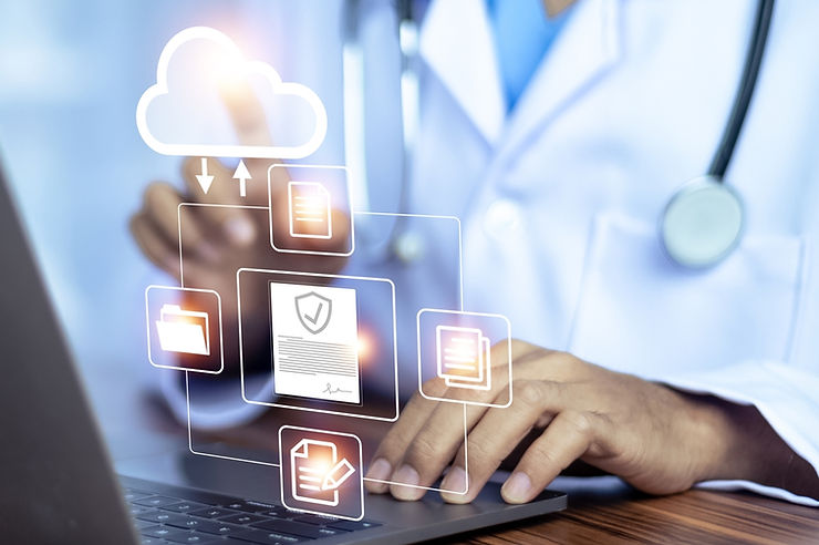 Doctor using a laptop with holographic cloud icons, files, and documents. Office setting, blue and white colors. Tech and healthcare theme.