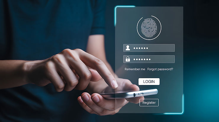 A person using a smartphone to access a login screen with fingerprint icon and options to log in or register. Dark, tech-themed background.