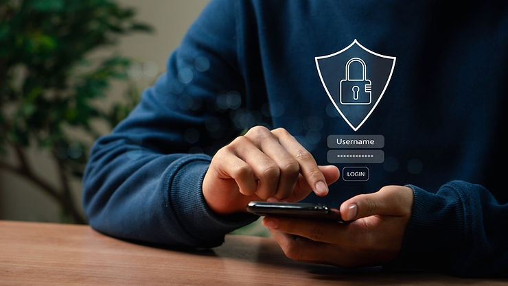 Person in blue sweater uses a smartphone. A digital lock icon and login fields with "Username" and "Login" are overlaid. Green plant in background.