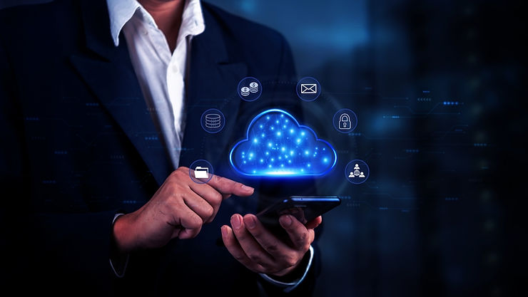 Businessman in a suit uses a smartphone with glowing cloud icons hovering above, on a dark blue tech-themed background.