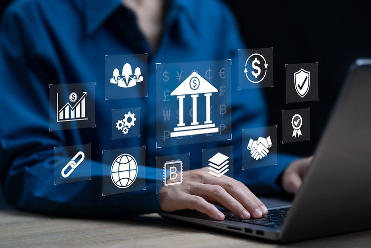 Person typing on a laptop, surrounded by financial and business icons, including a bank, currency, and chart symbols. Blue background.