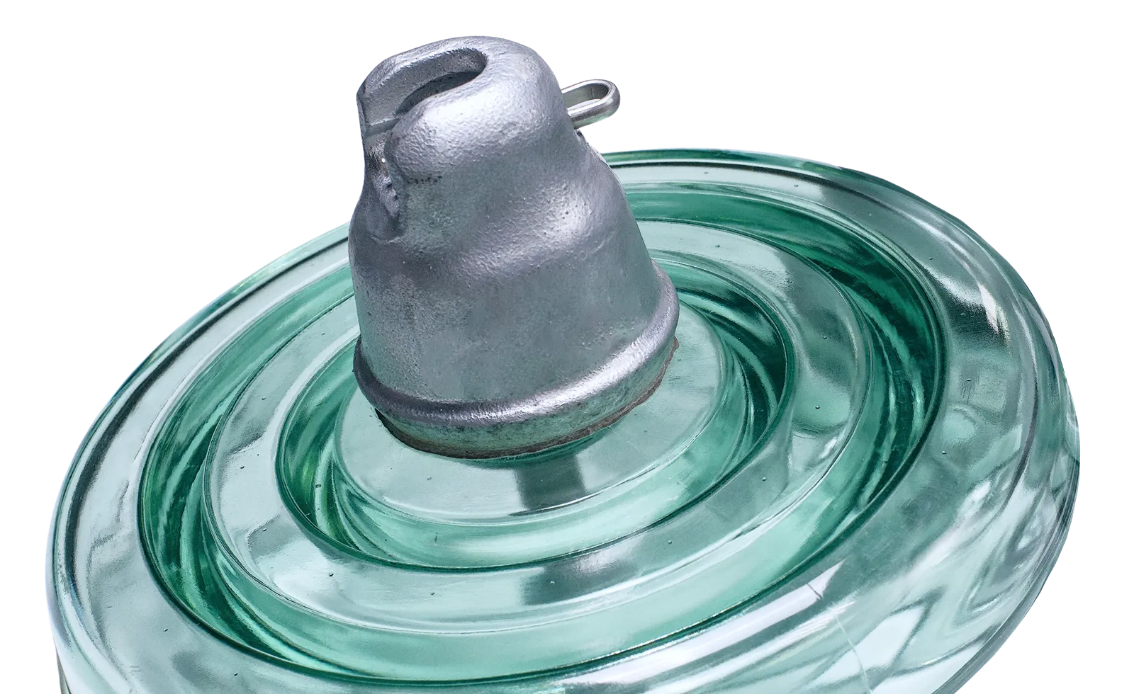 Close-up of a high-voltage suspension glass insulator with galvanized metal cap.