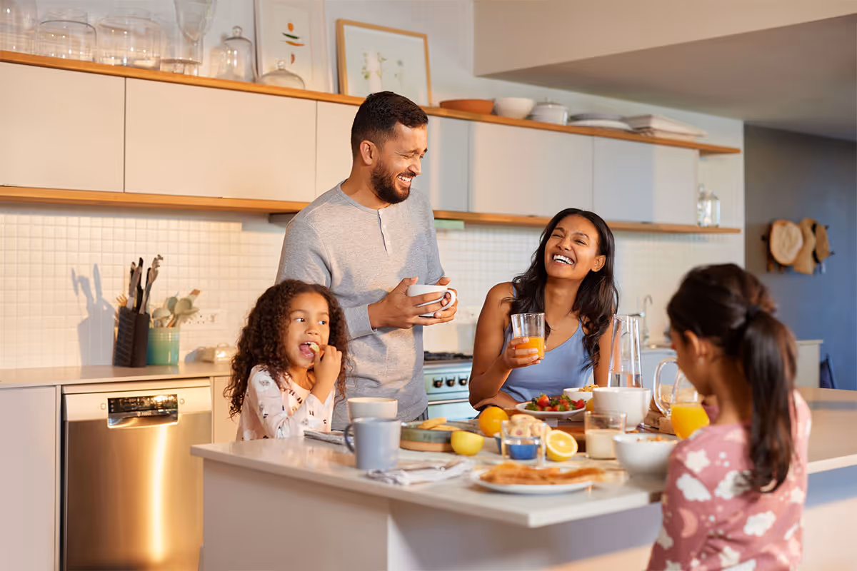 A family enjoying breakfast together.