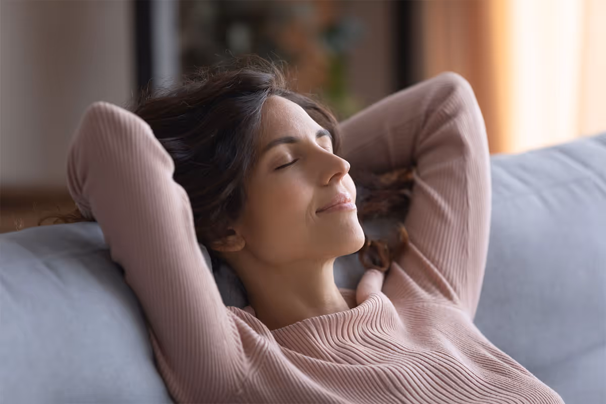 A person breathing clean air at home.