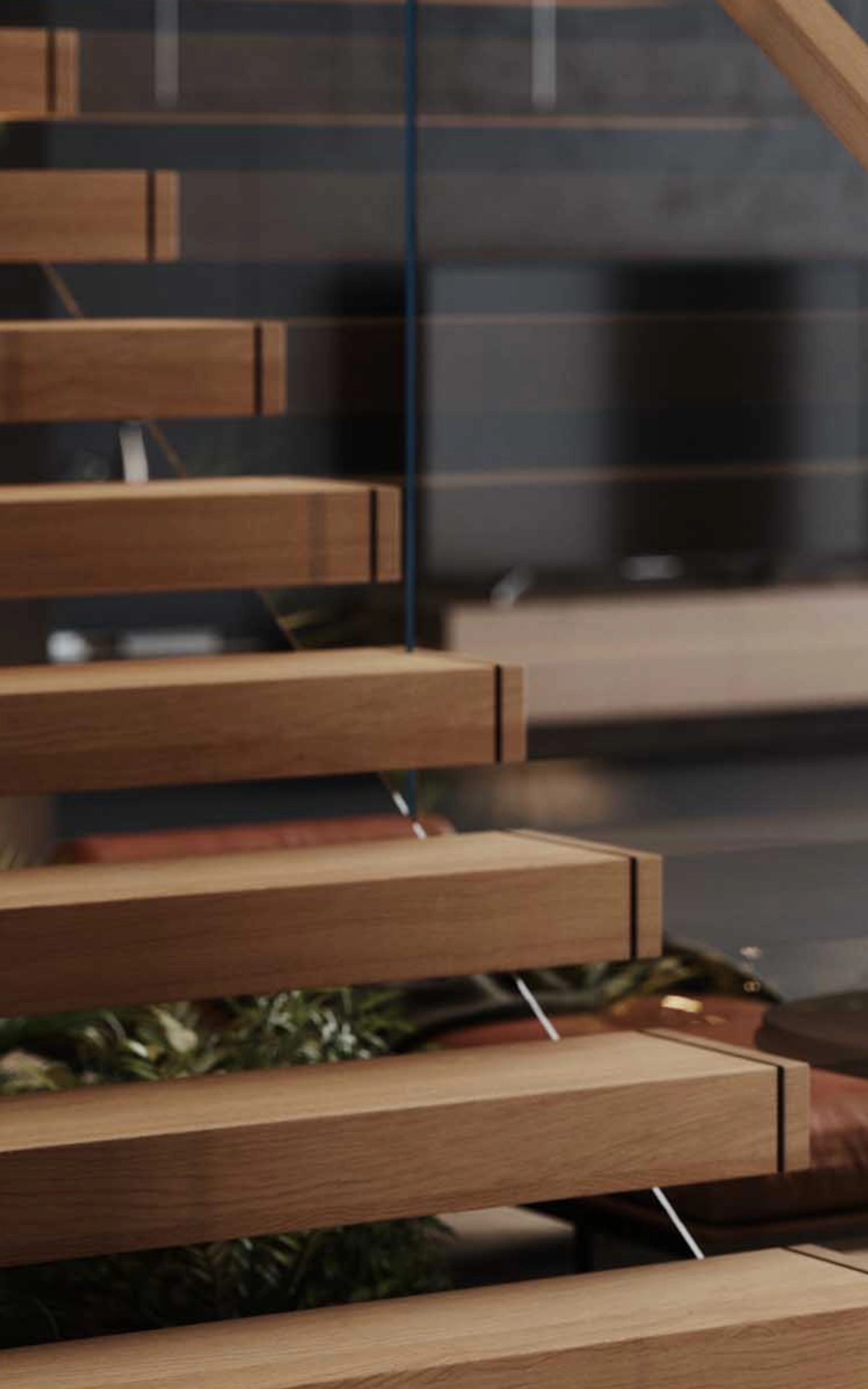Close-up of a FLIGHT Cantilever floating staircase with Vedera glass railing in a living space.