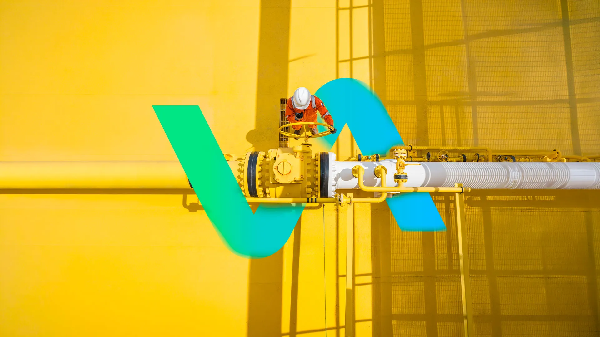 Vanne industrielle jaune sur une canalisation, avec le sigle Atlantic Ingénierie