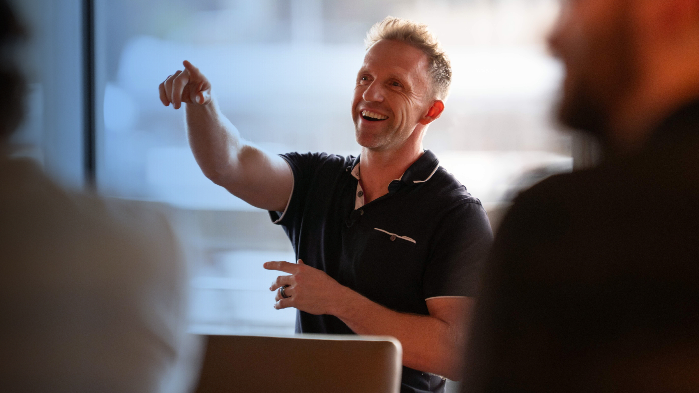 Coach walking through a Meta ads strategy
