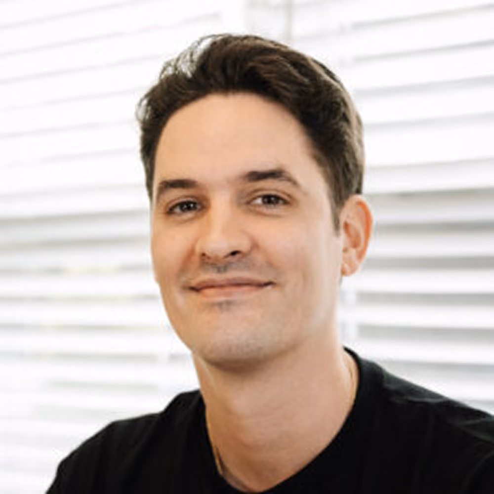 A professional photo of our team member, Brendan.
