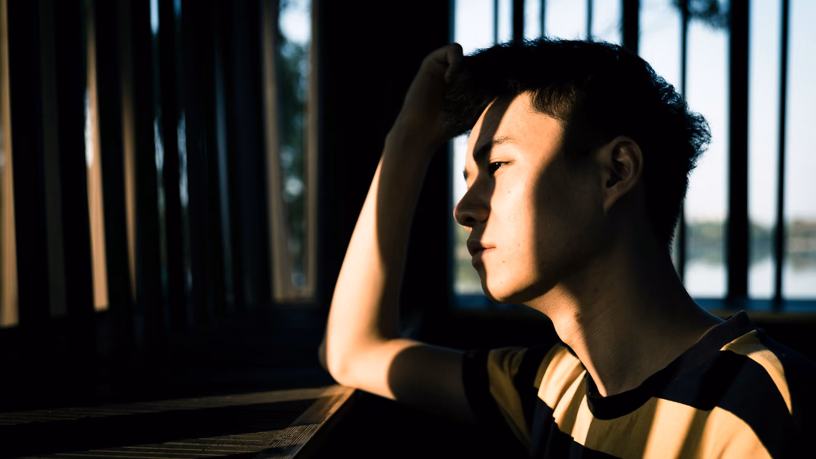 A young man thinking.