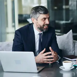 A man sitting down talking