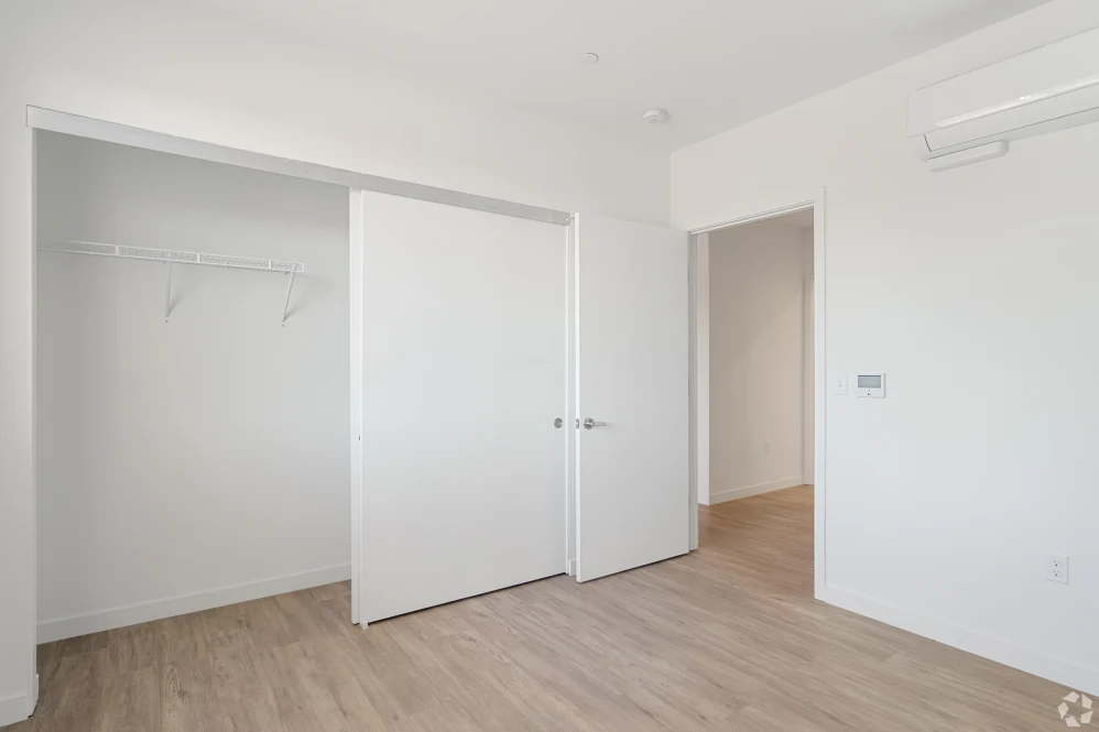 Empty bedroom with closet