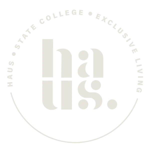 Haus logo emblem with stylized text 'haus.' enclosed in a circular design.