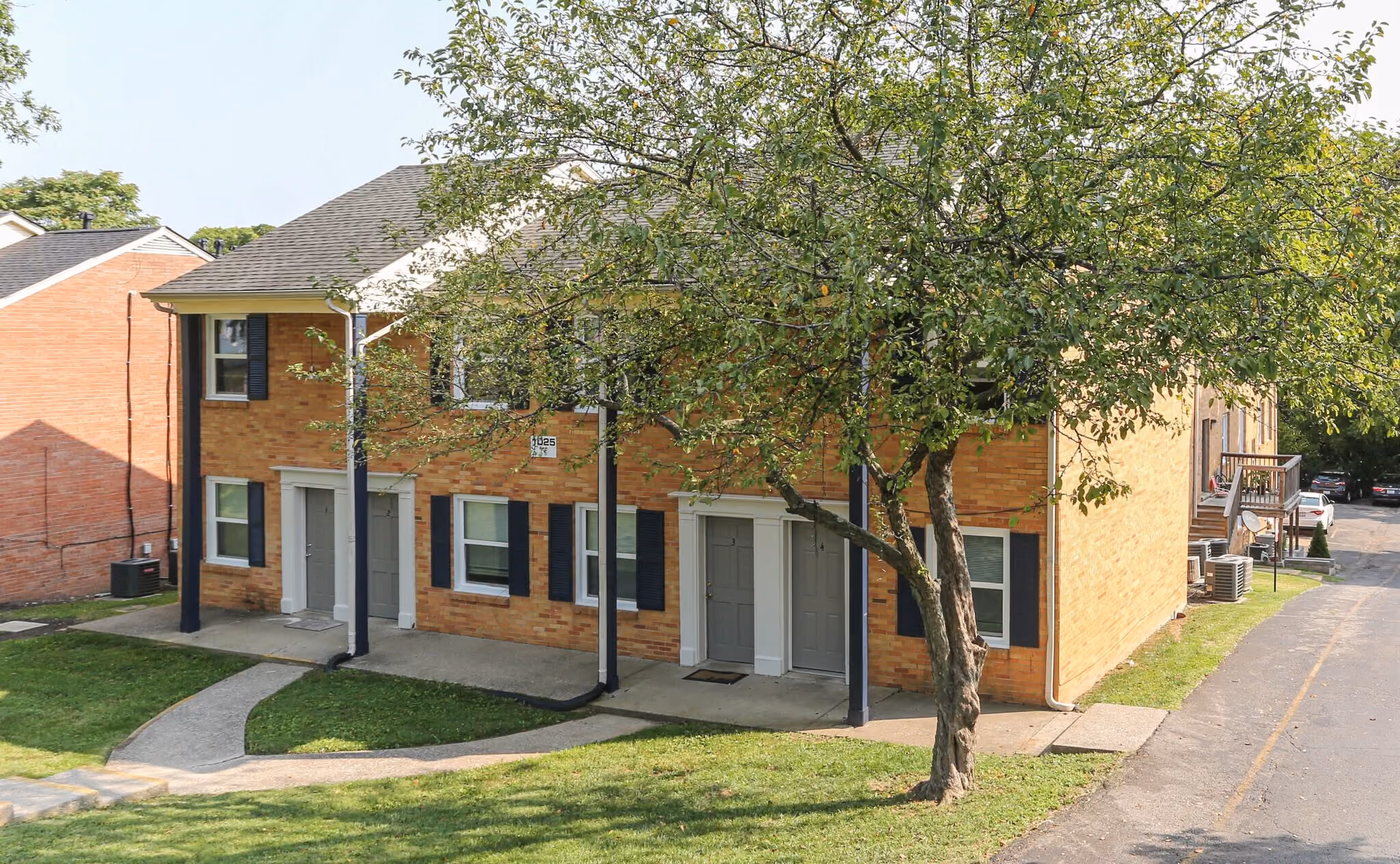 Exterior of apartments with tree