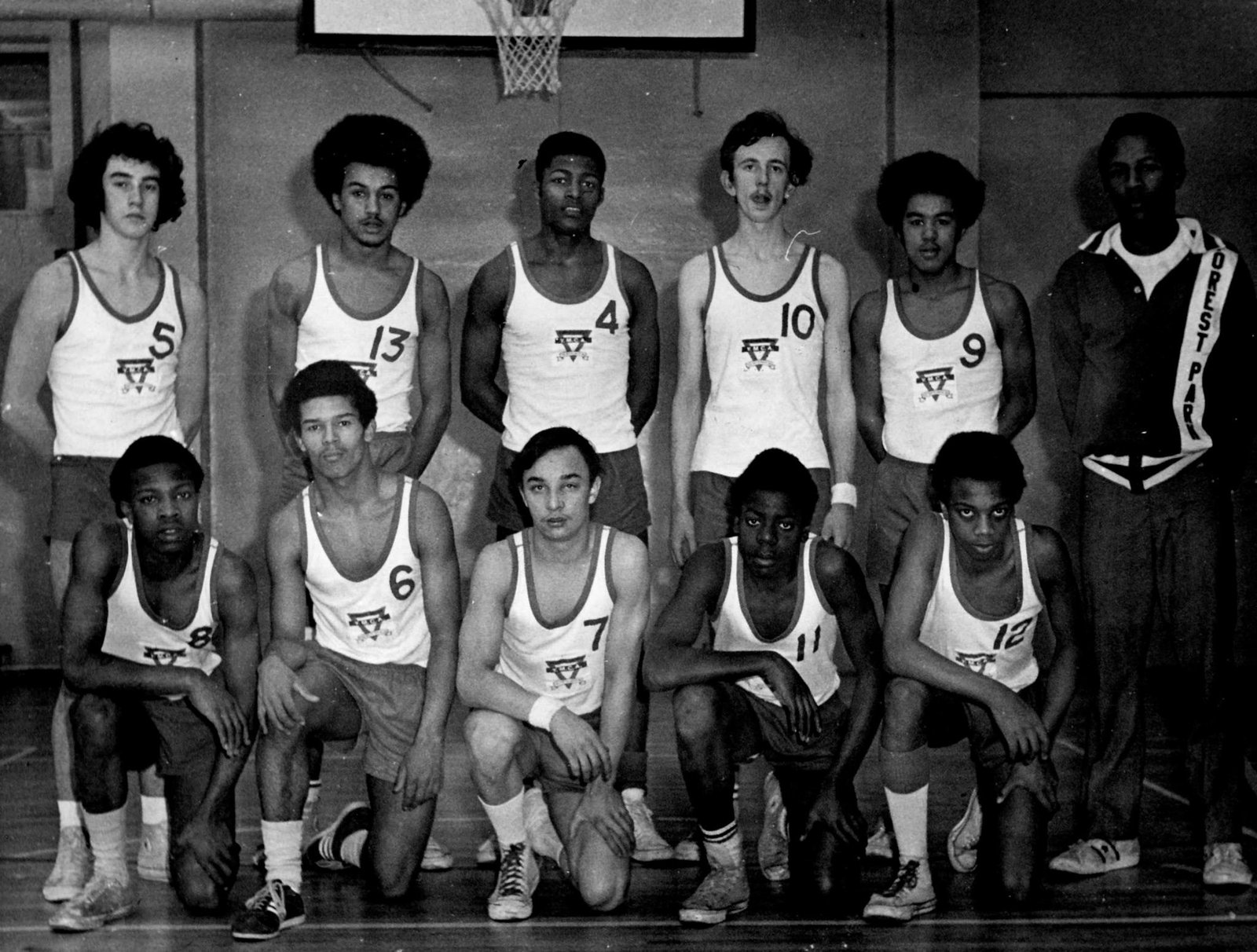 An early Topcats squad in club vests, black and white team photo
