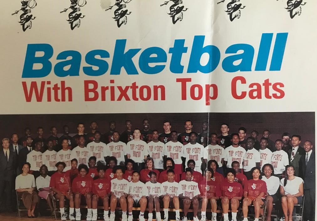 The whole club under a Basketball With Brixton Top Cats banner