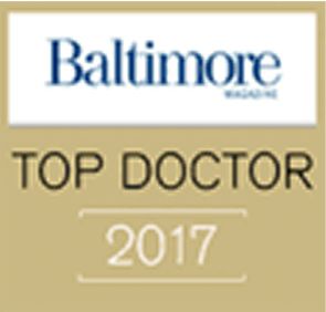 A logo featuring the text 'Baltimore' in blue above the words 'TOP DOCTOR' in black and the year '2017' in a smaller font below.