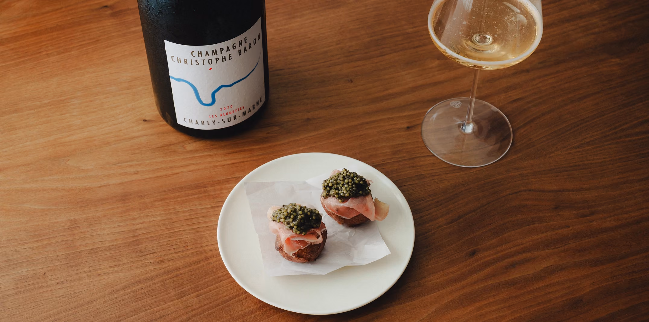 Herb-topped bites served with Champagne Christophe Baron