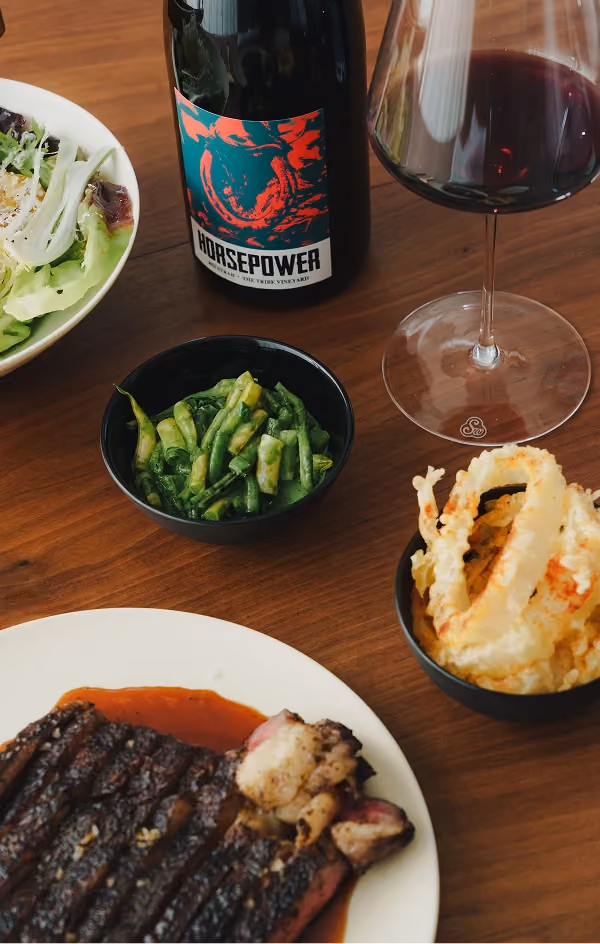 Grilled steak with onion rings and green beans, paired with Horsepower The Tribe Vineyard Syrah