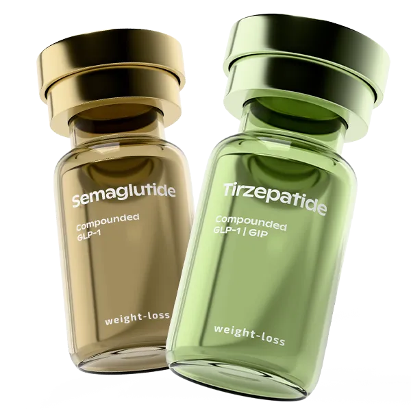 Two glass medicine vials, one gold labeled 'Semaglutide compounded GLP-1 weight-loss' and one green labeled 'Tirzepatide compounded GLP-1 | GIP weight-loss'.
