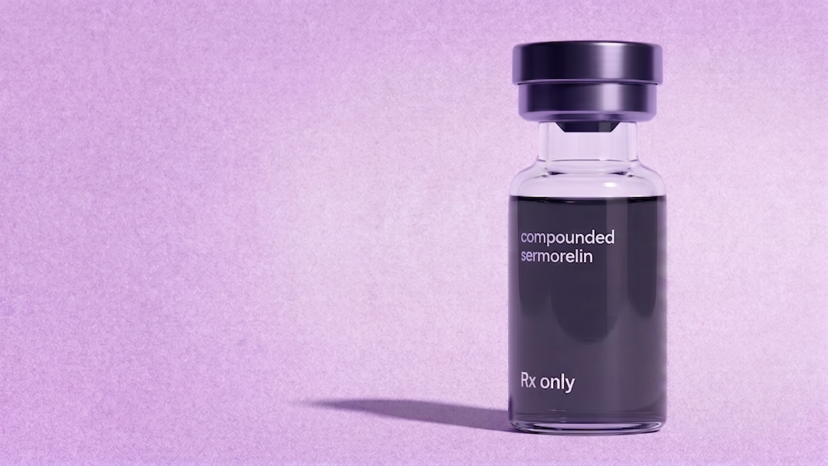 A small clear glass vial with a dark purple cap, filled with dark liquid labeled 'compounded sermorelin' and 'Rx only' on a textured lavender background.
