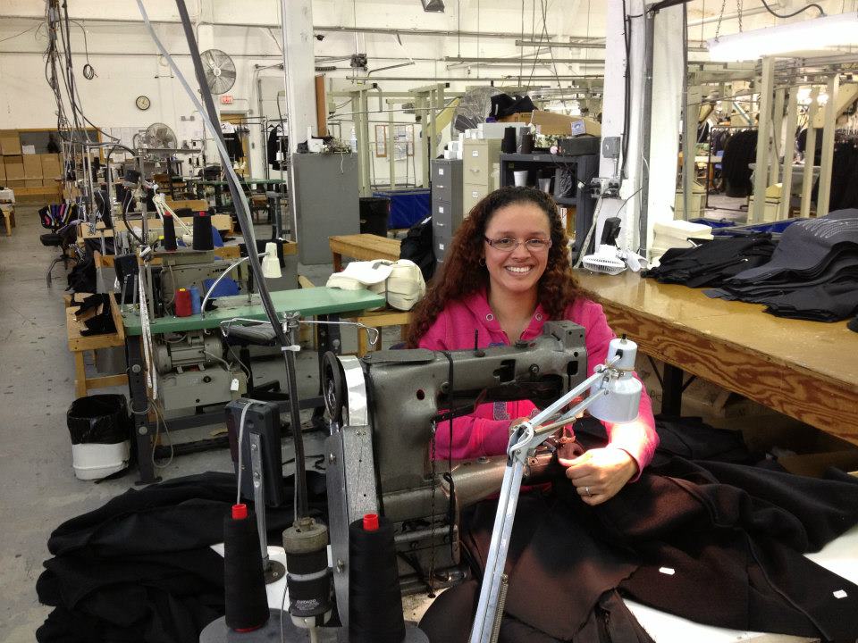Local 281 stitcher at her machine