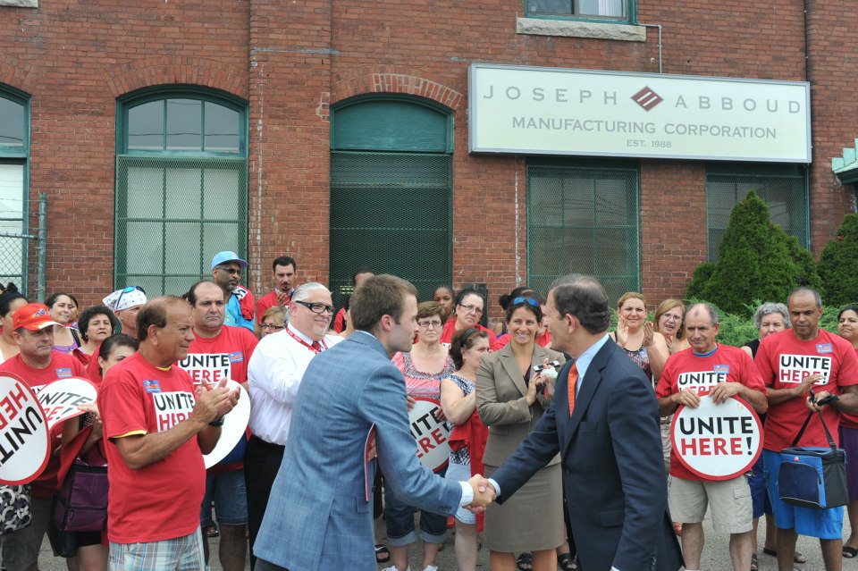 Joseph Abboud workers gathered outside the plant