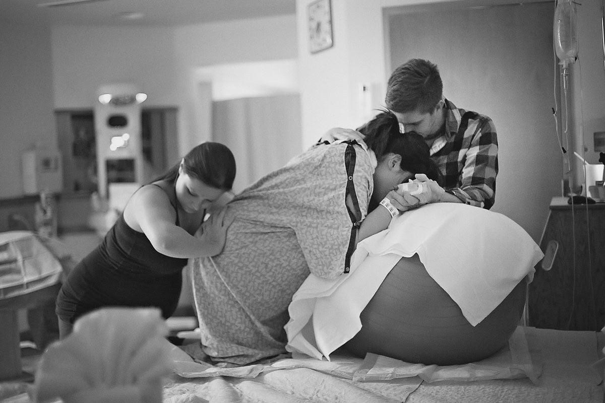 A therapist providing hands-on care to a patient