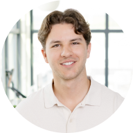 A brightly lit headshot of Nick Roethlein