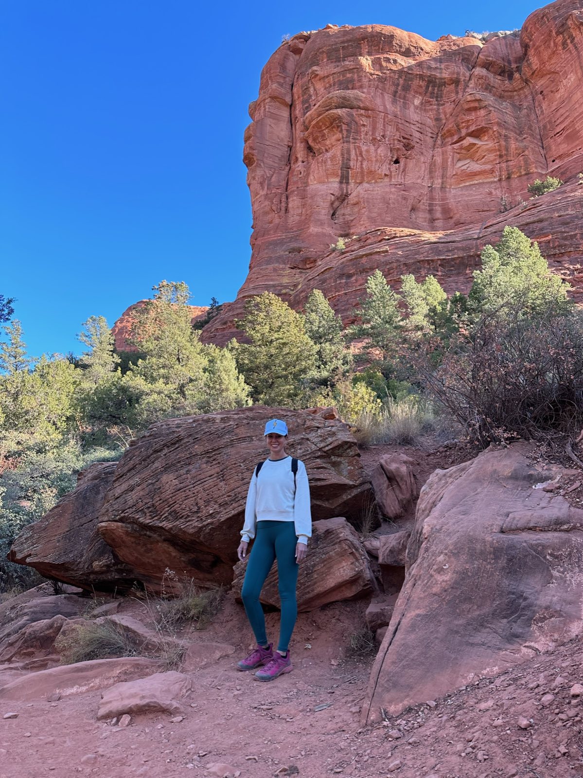Christi Wolfe hiking the red rocks near Sedona, Arizona