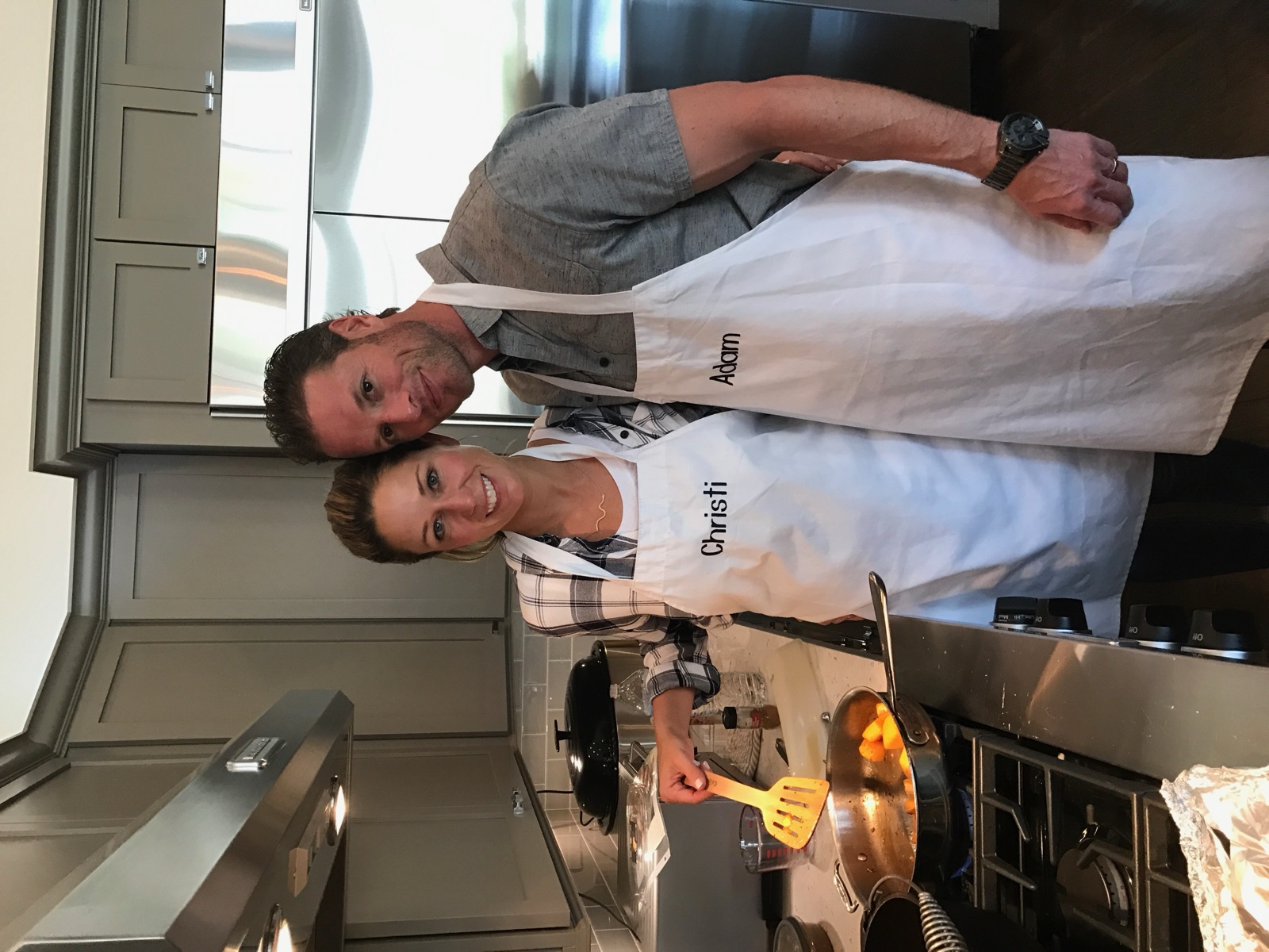 Christi Wolfe cooking with Adam