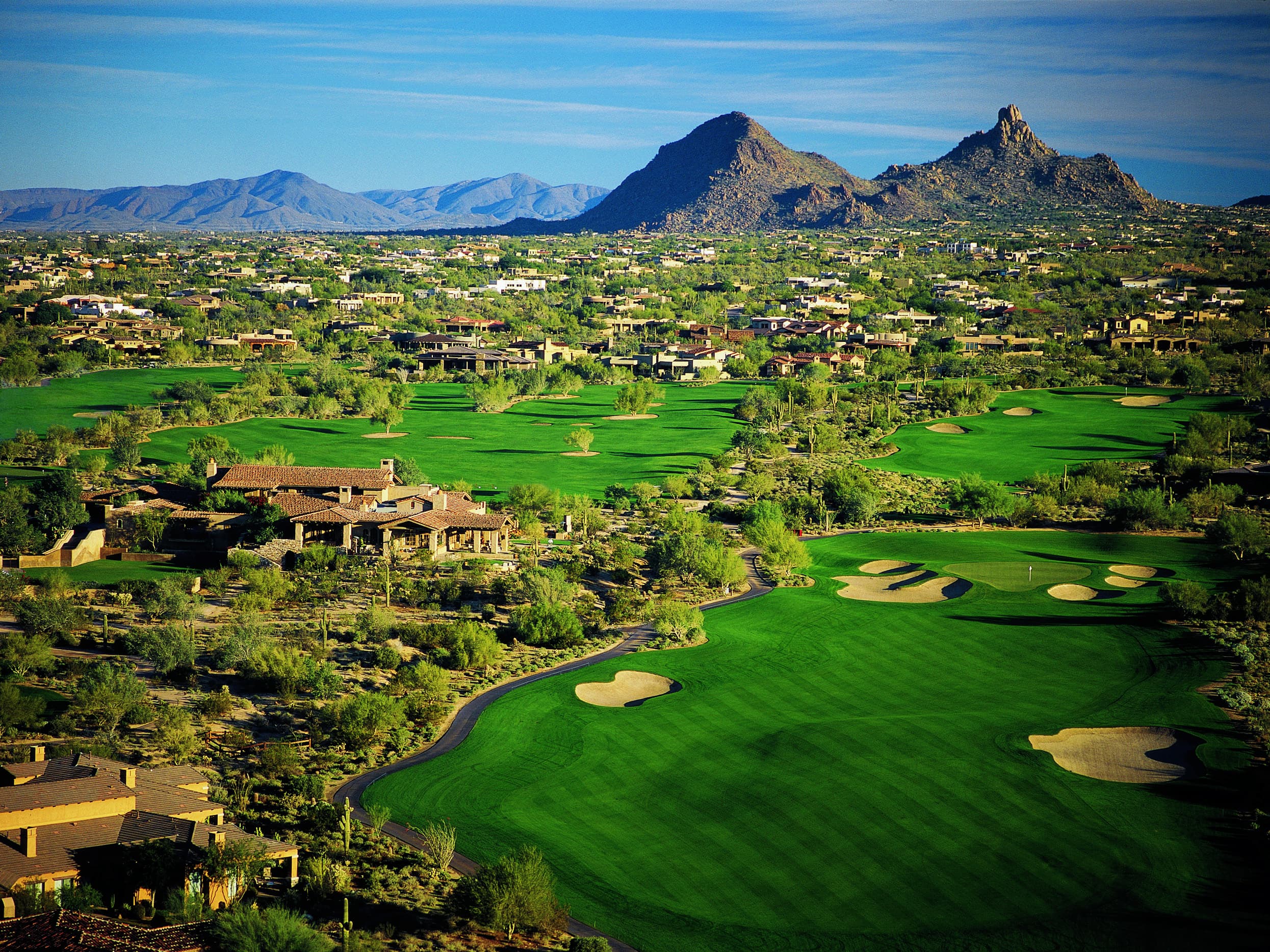 Aerial view of the DC Ranch golf course set against the McDowell Mountains in North Scottsdale