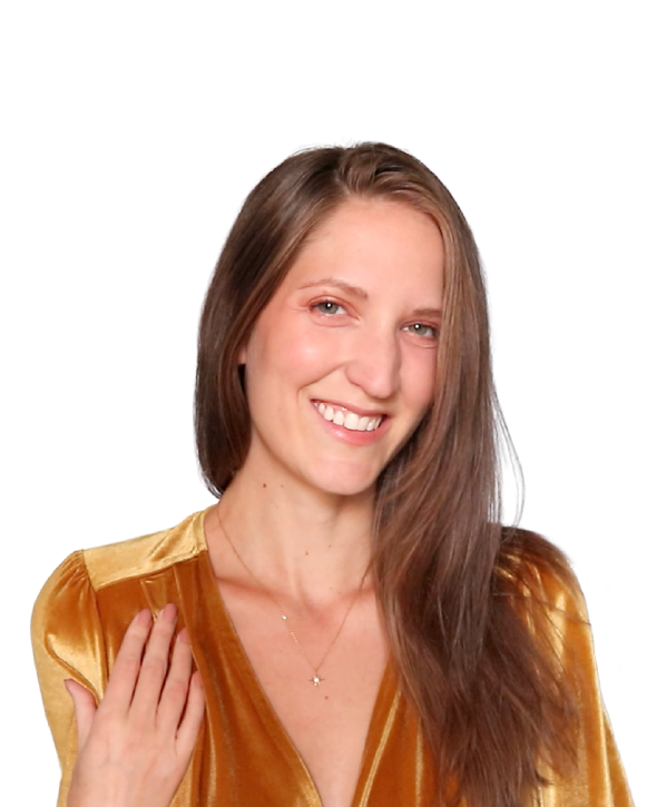 Portrait of Kinsey smiling in a gold velvet top.