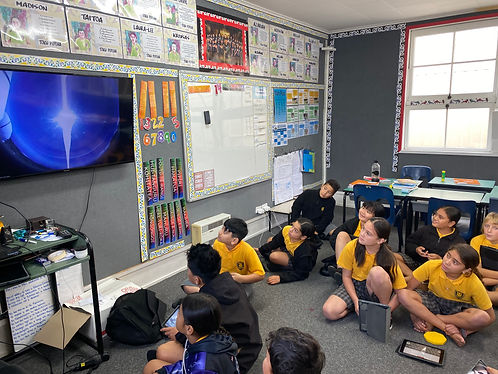 Students in class observing space phenomena