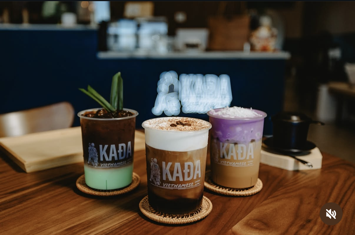 Three Vietnamese coffee and tea drinks, including ube latte, in KAĐA cups