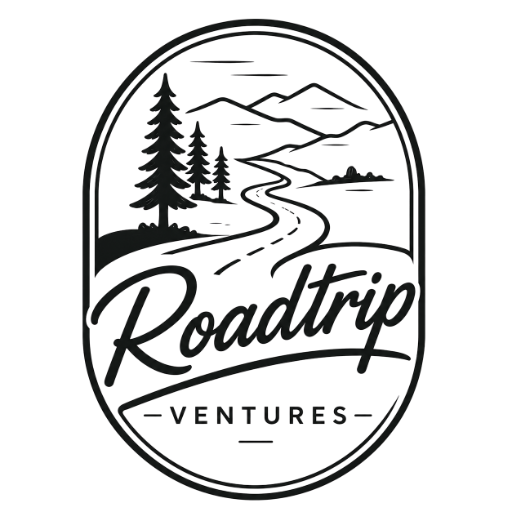 Logo with winding road, pine trees, mountains, and text 'Roadtrip Ventures' in script and block letters.