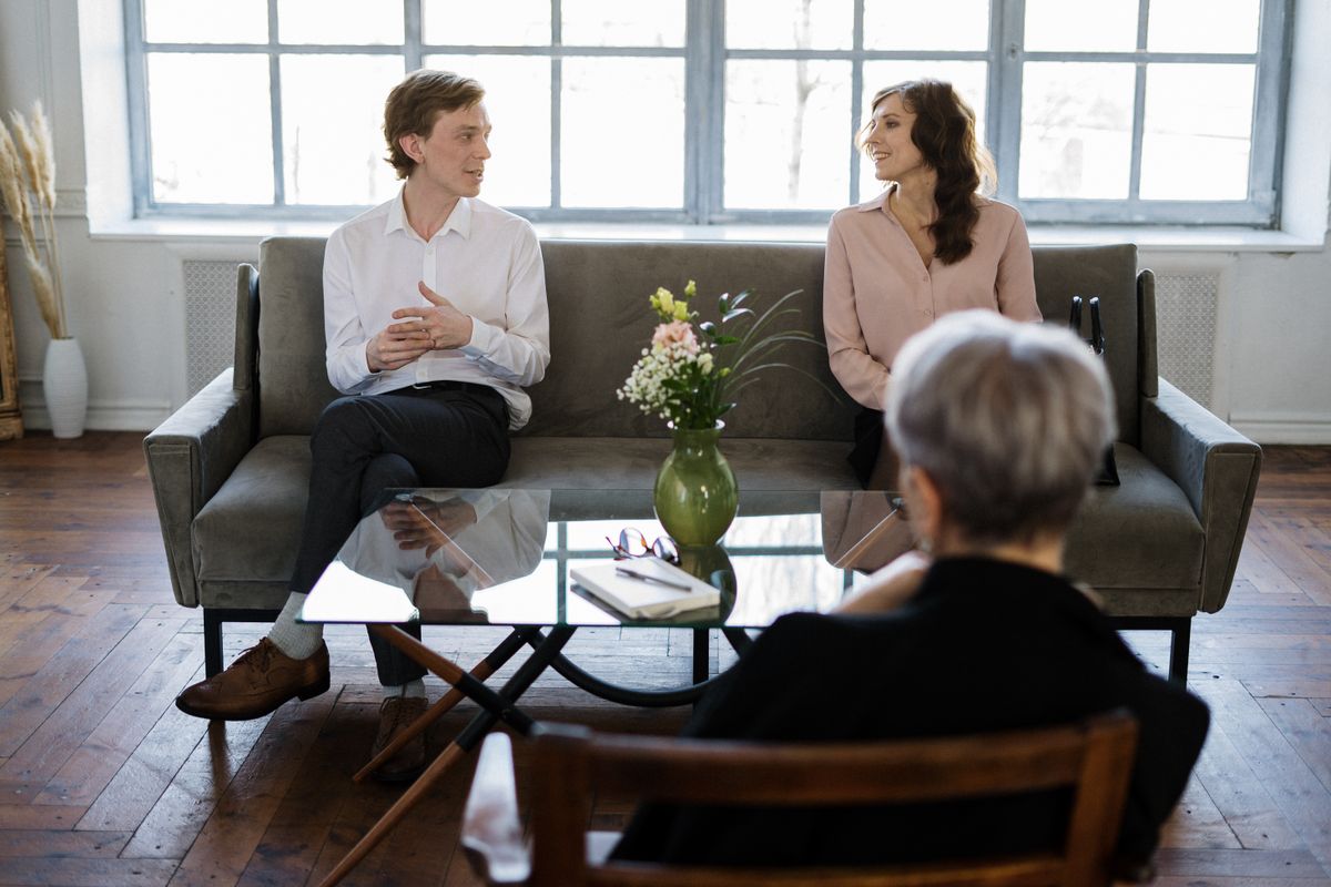 A family talking through their options in a meeting
