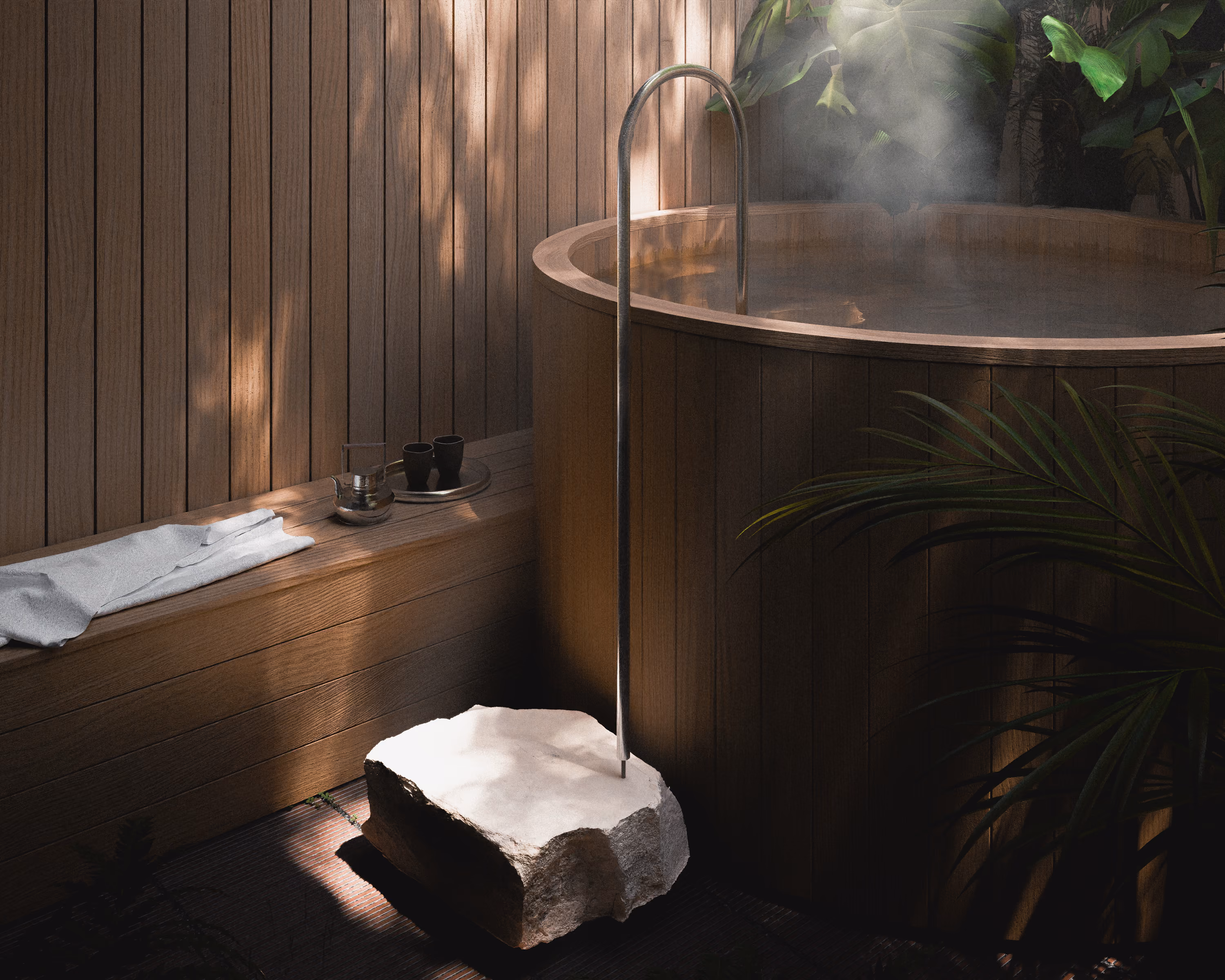Steam rises from a wood-clad soaking tub surrounded by plants within a private portion of the garden.