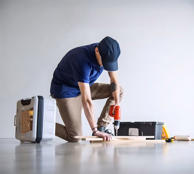 men drilling wood image