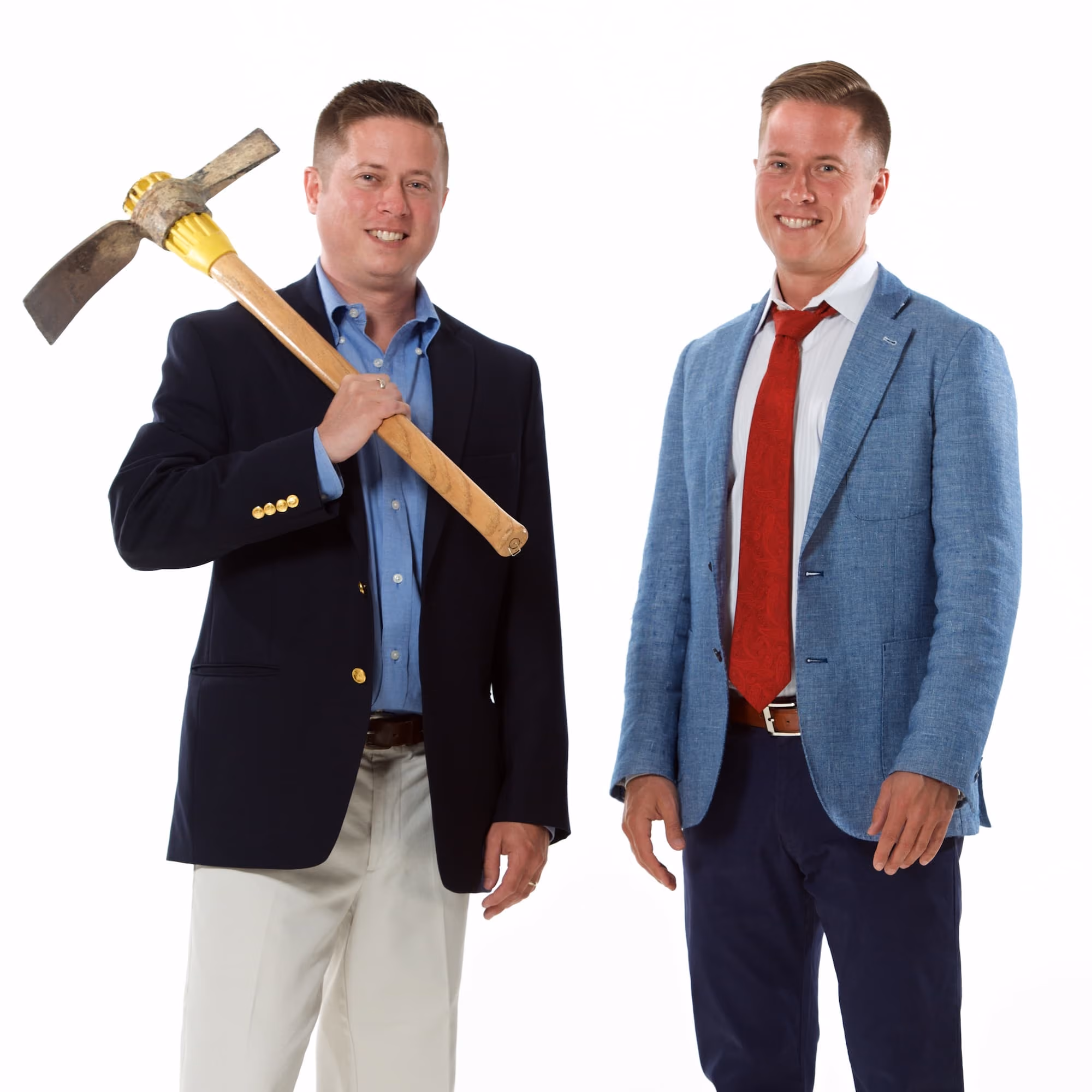 Matt Painter holding a pickaxe alongside Mitch Painter representing Prestige property improvements in 2003