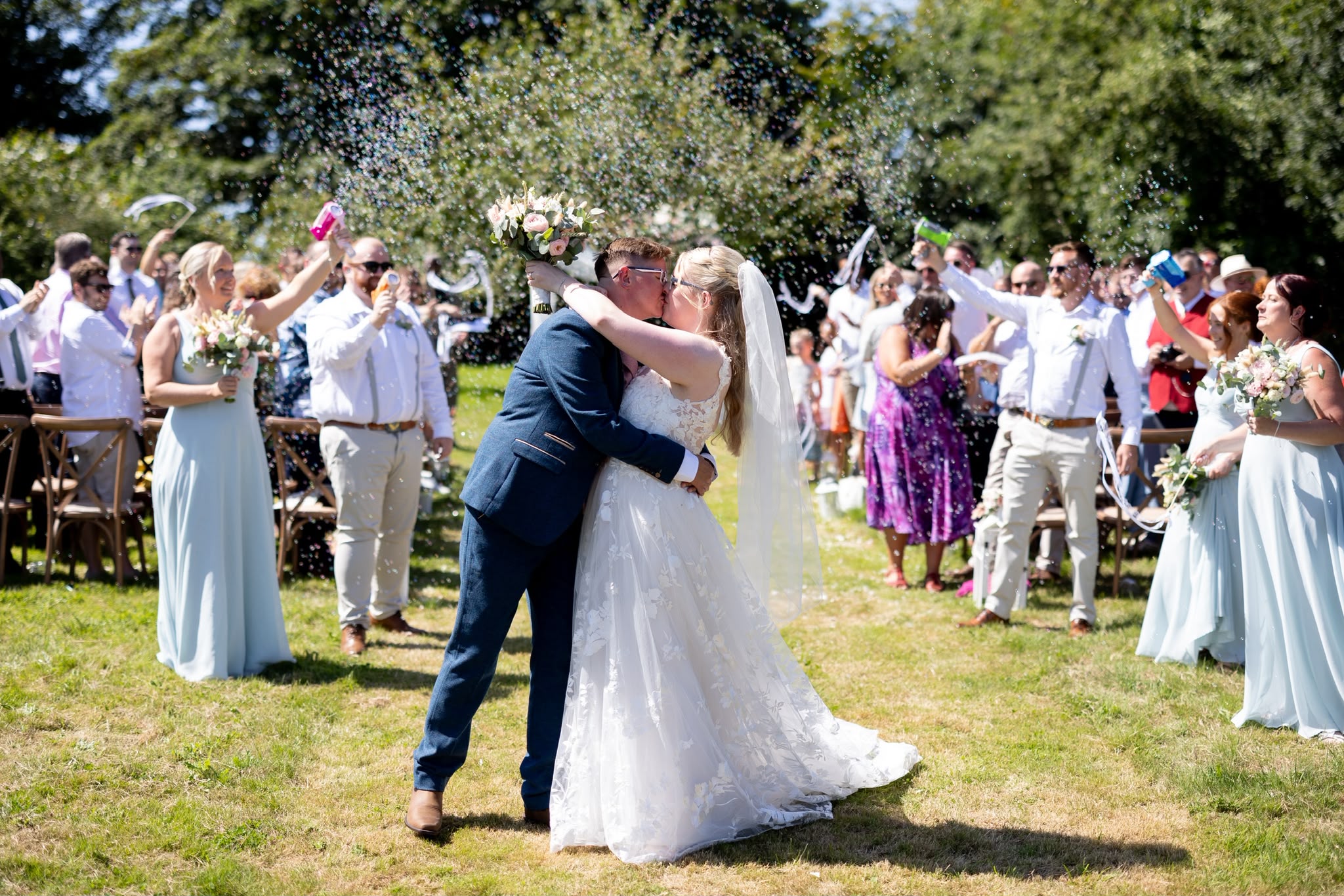 A wedding table laid outdoors at Hedgerow House