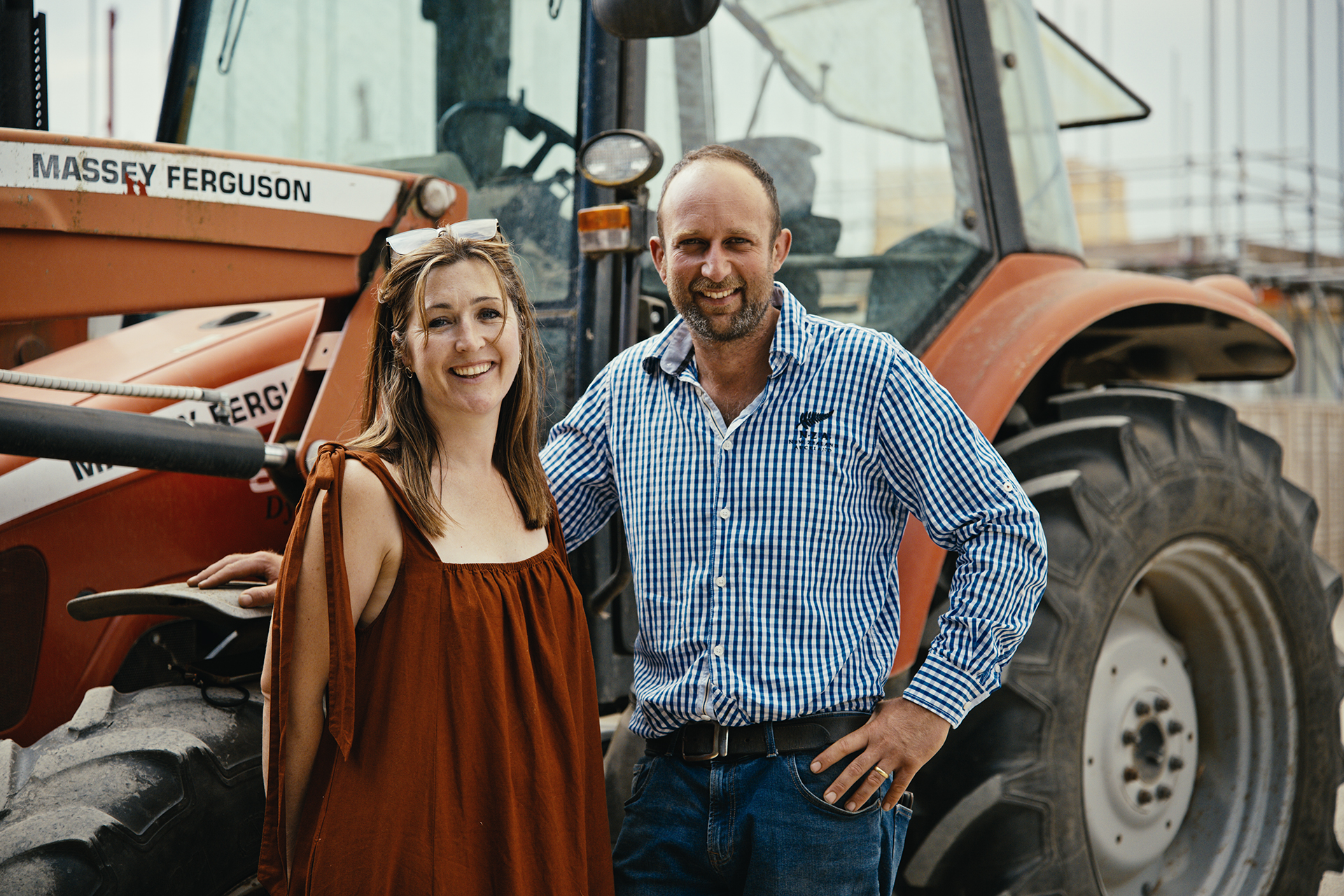 Laurent and Paris standing together in the cutting garden at the farm