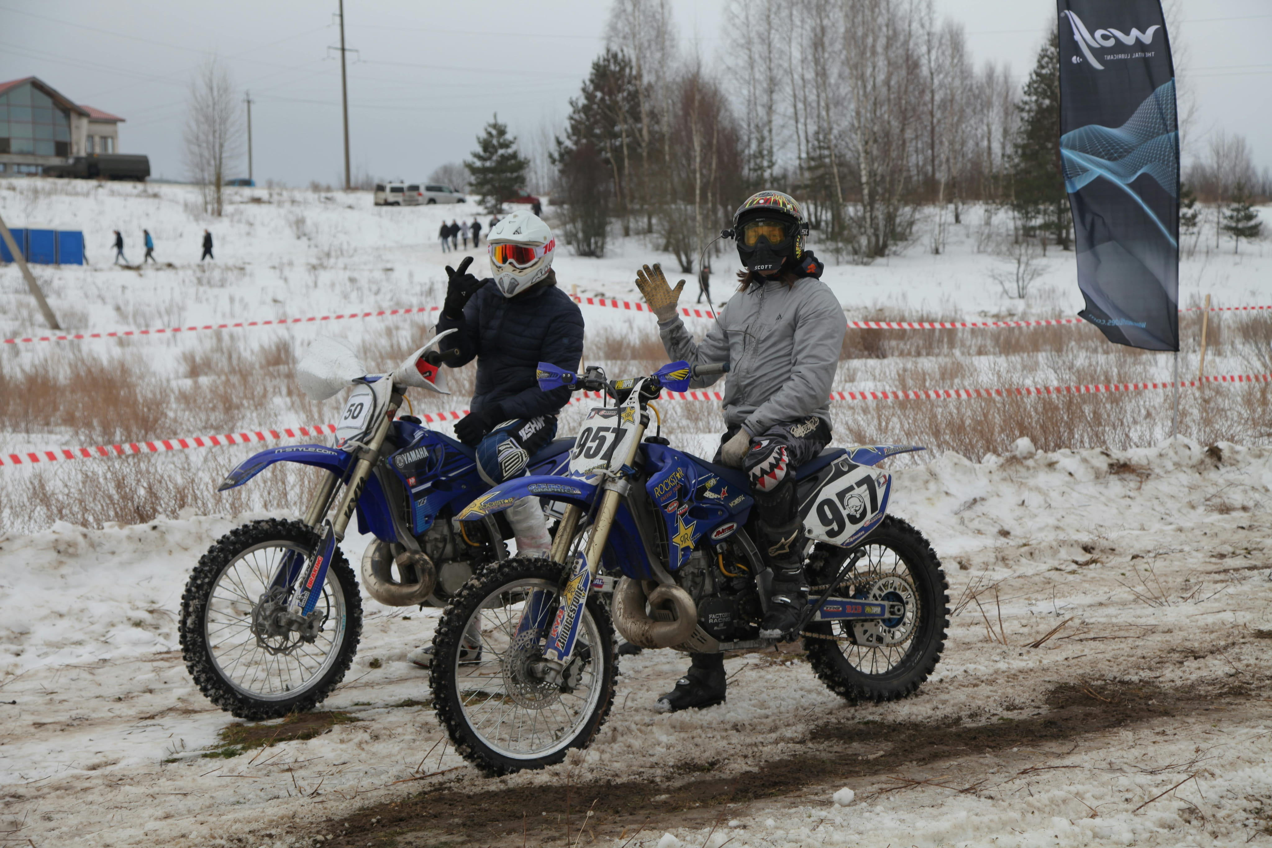 Motocross riders in the snow