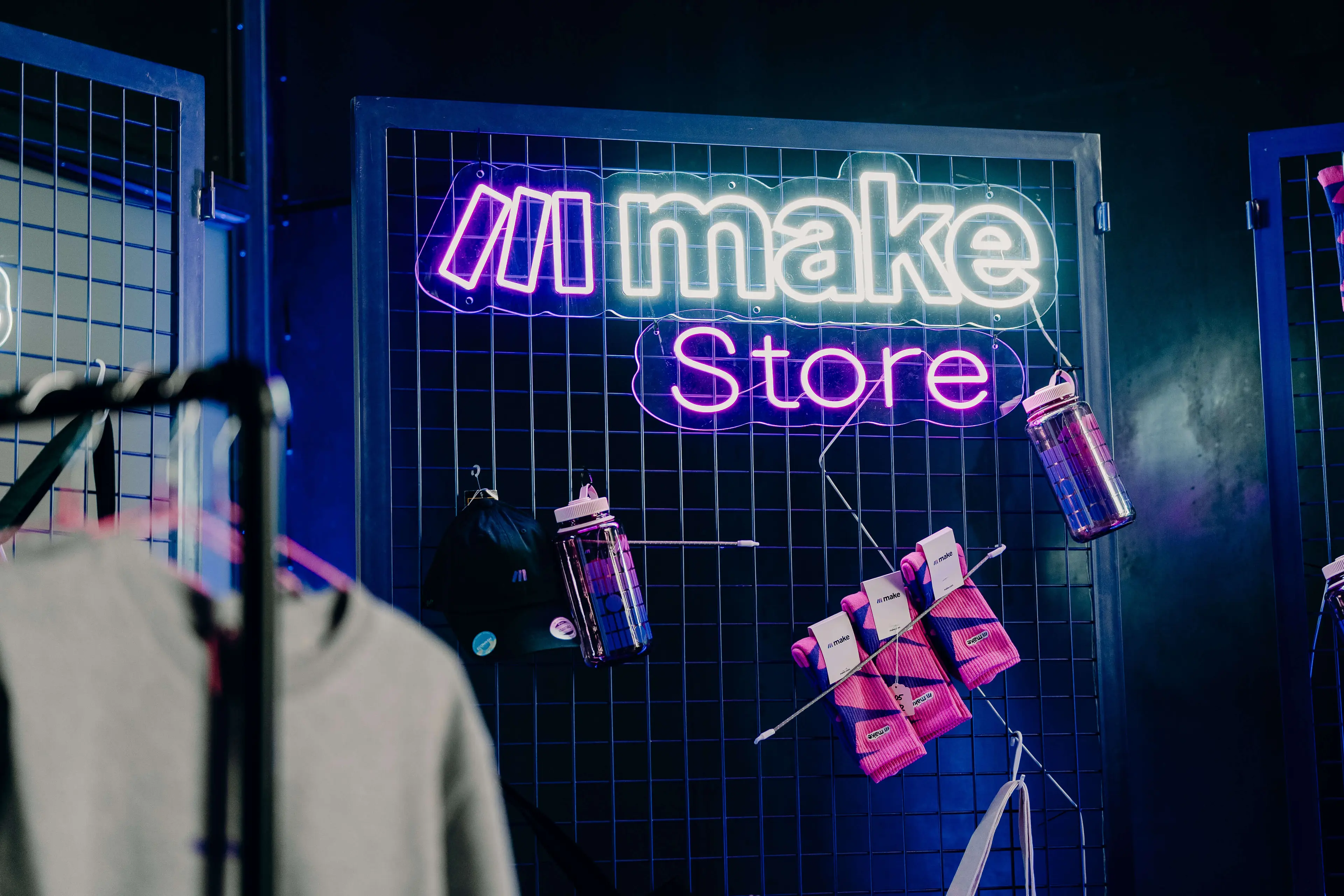 Make Store neon sign at Waves '25