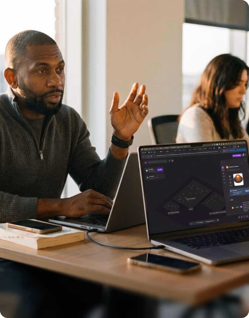 Partner presenting to a client with a laptop